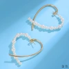 Heart-shaped simple earrings, Korean stud jewelry wholesale, Dongdaemun fashionable French high-end style pearl earrings undefined
